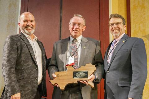 J.D. Strong, Director,&nbsp;Oklahoma Department of Wildlife Conservation; Paul Johansen, Award Recipient; Eric Sutton, President, SEAFWA