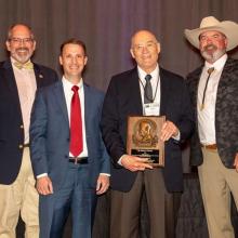 Rober Warren receiving the SEAFWA Watson Award 2023
